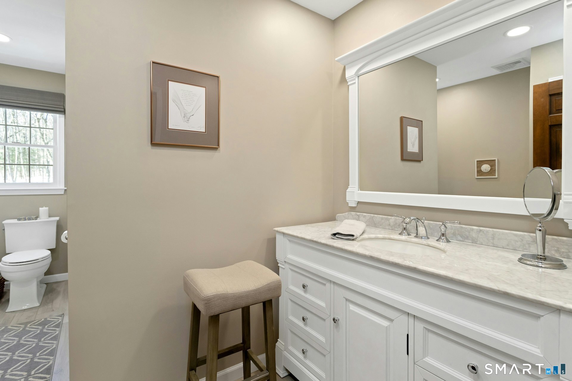 295 Judd Road Easton, CT 06612 - Photo 13 of 33 a bathroom with a sink toilet and a mirror