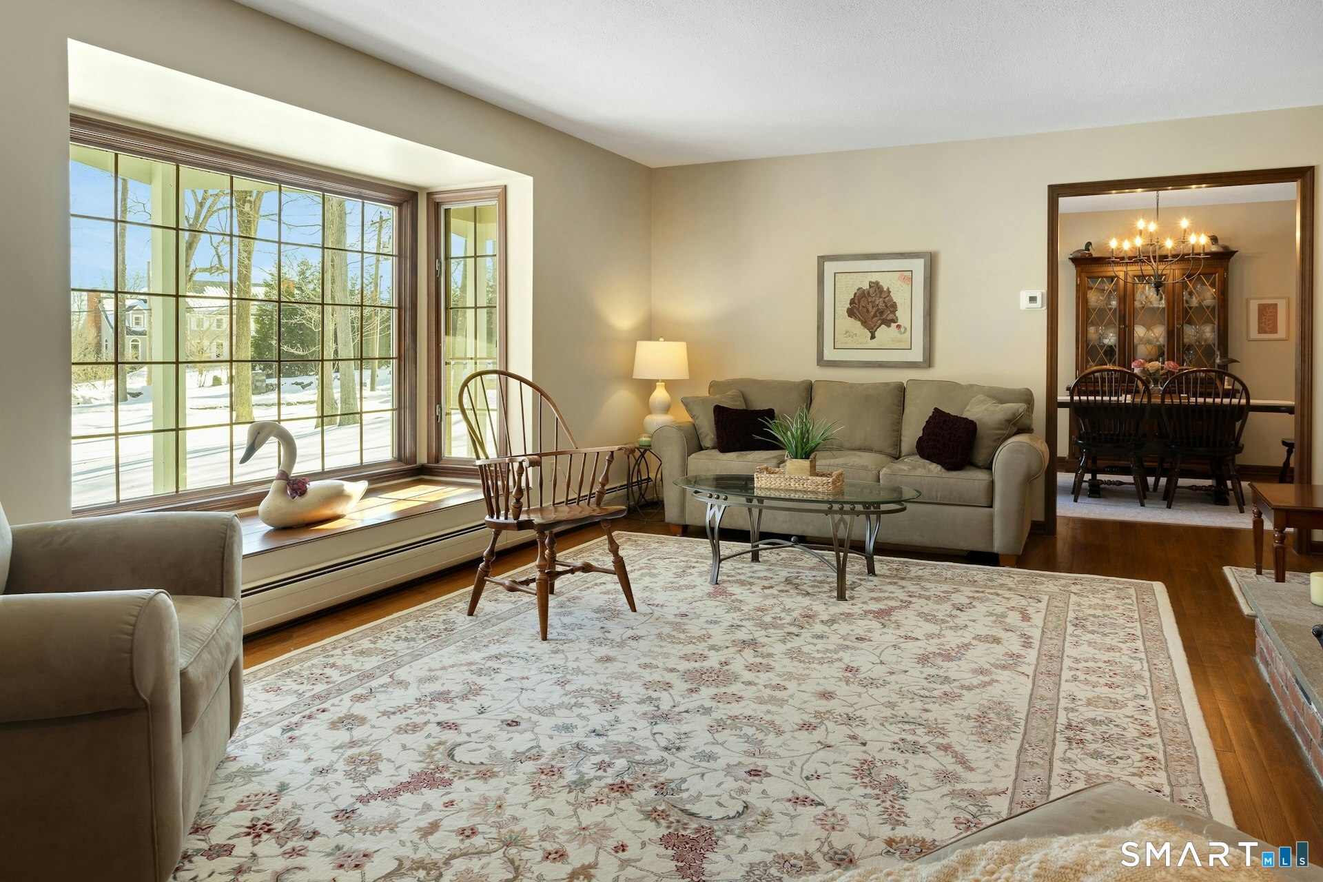 295 Judd Road Easton, CT 06612 - Photo 18 of 33 a living room with furniture and a large window