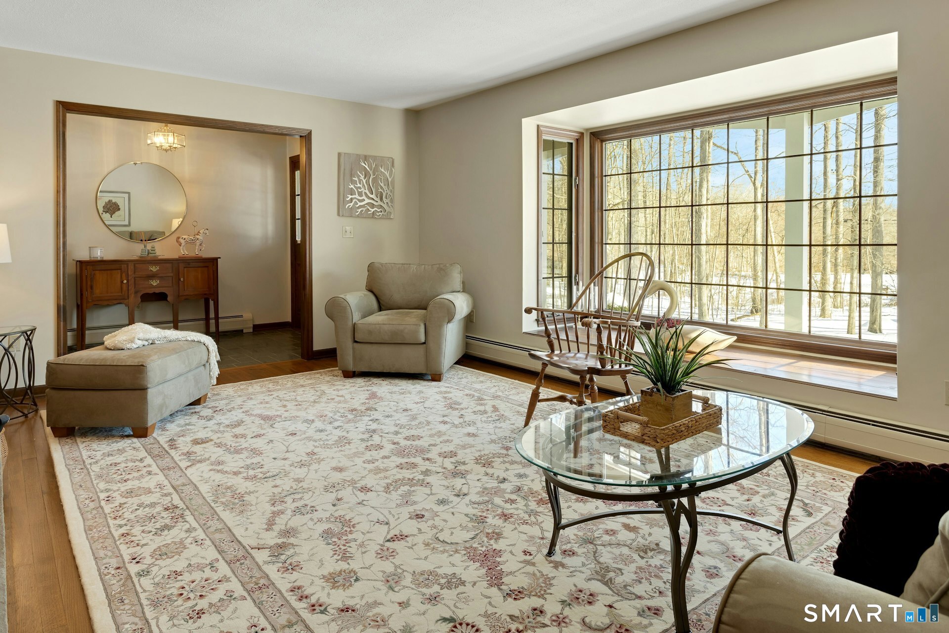 295 Judd Road Easton, CT 06612 - Photo 19 of 33 a living room with furniture and a window