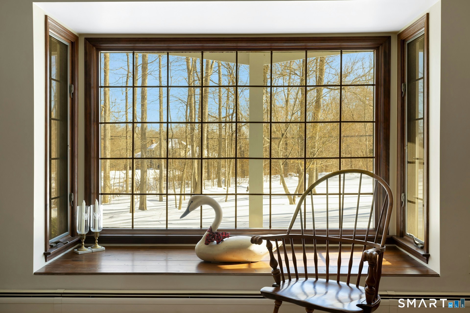 295 Judd Road Easton, CT 06612 - Photo 22 of 33 a view of a porch with two chairs