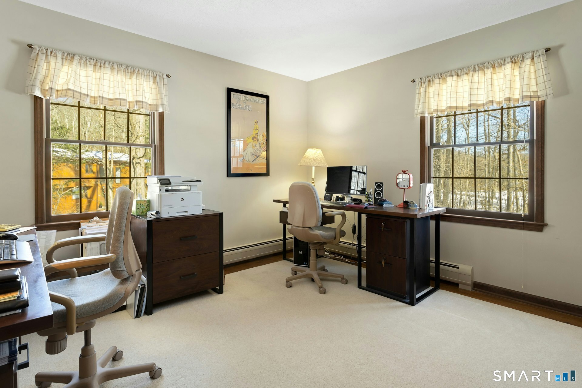 295 Judd Road Easton, CT 06612 - Photo 30 of 33 a view of a workspace with furniture and a window