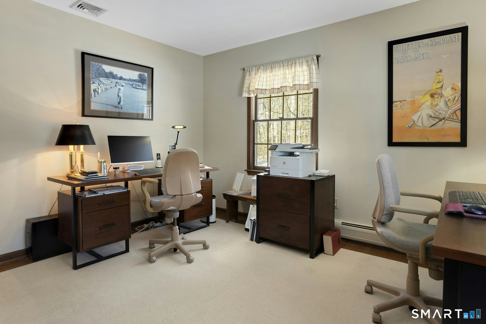 295 Judd Road Easton, CT 06612 - Photo 31 of 33 a view of a workspace with furniture and a window