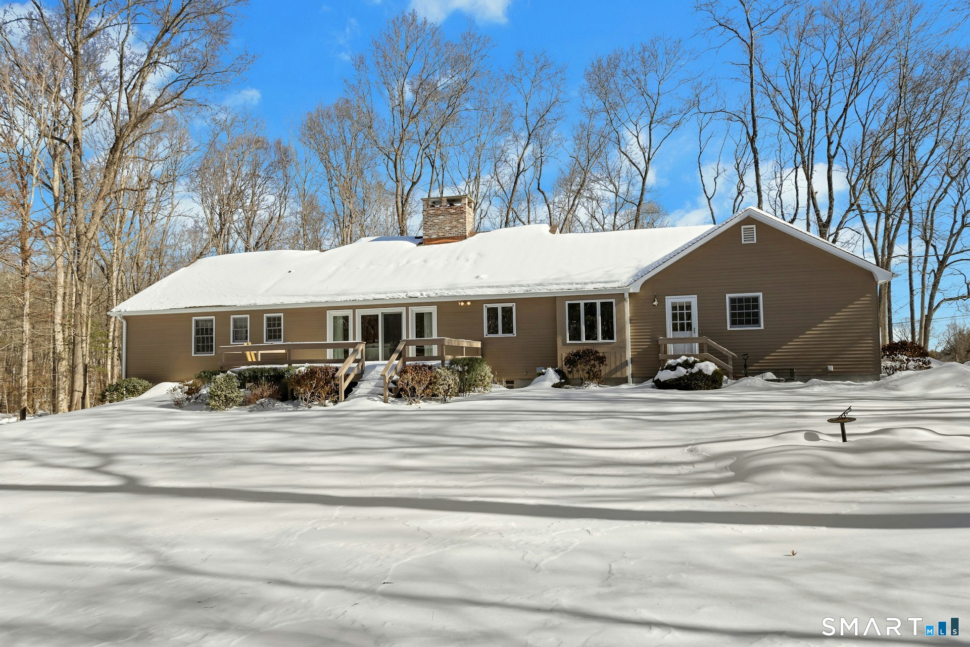 295 Judd Road Easton, CT 06612 - Photo 32 of 33 a front view of a house with a yard