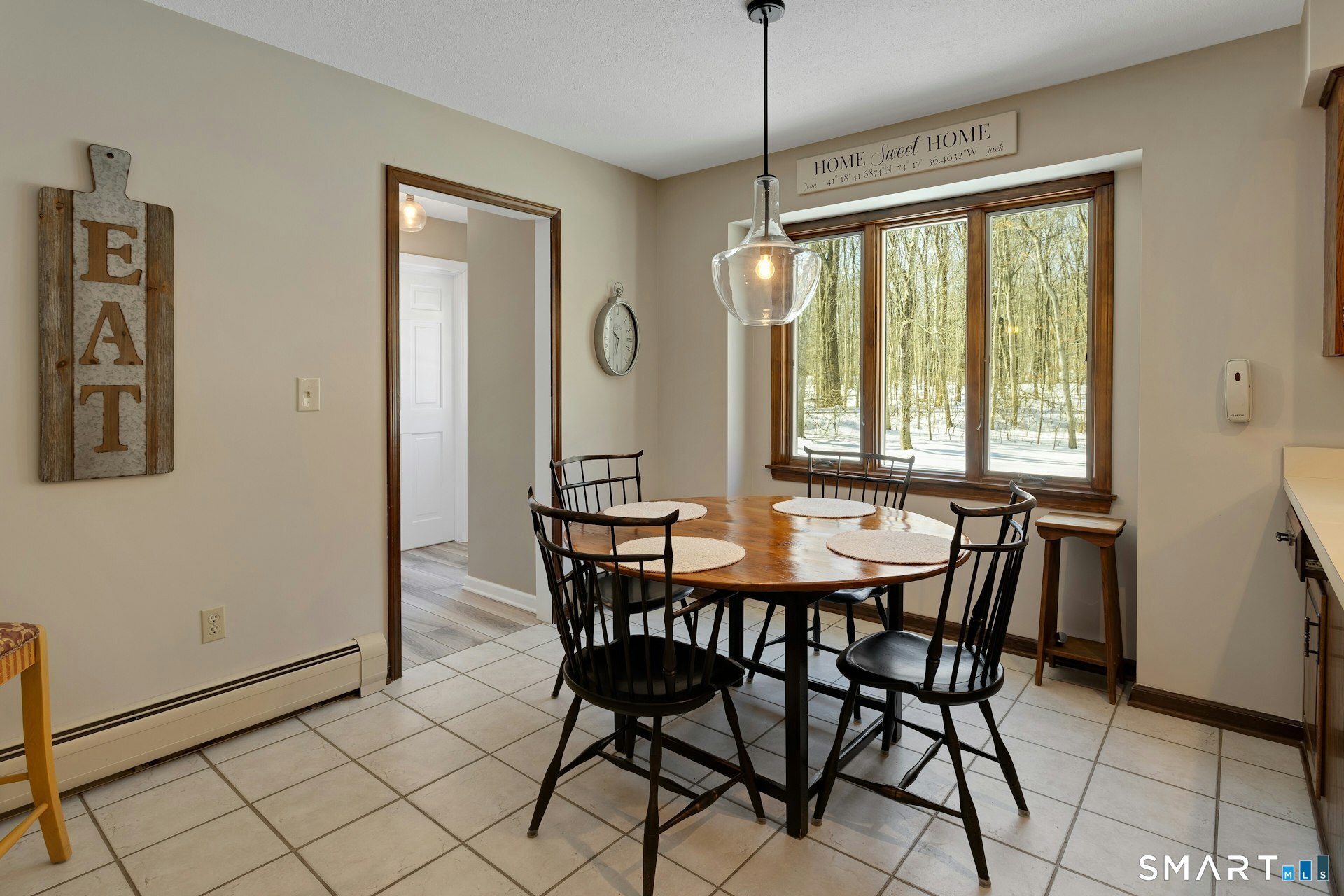 295 Judd Road Easton, CT 06612 - Photo 5 of 33 a view of a dining room with furniture window and outside view