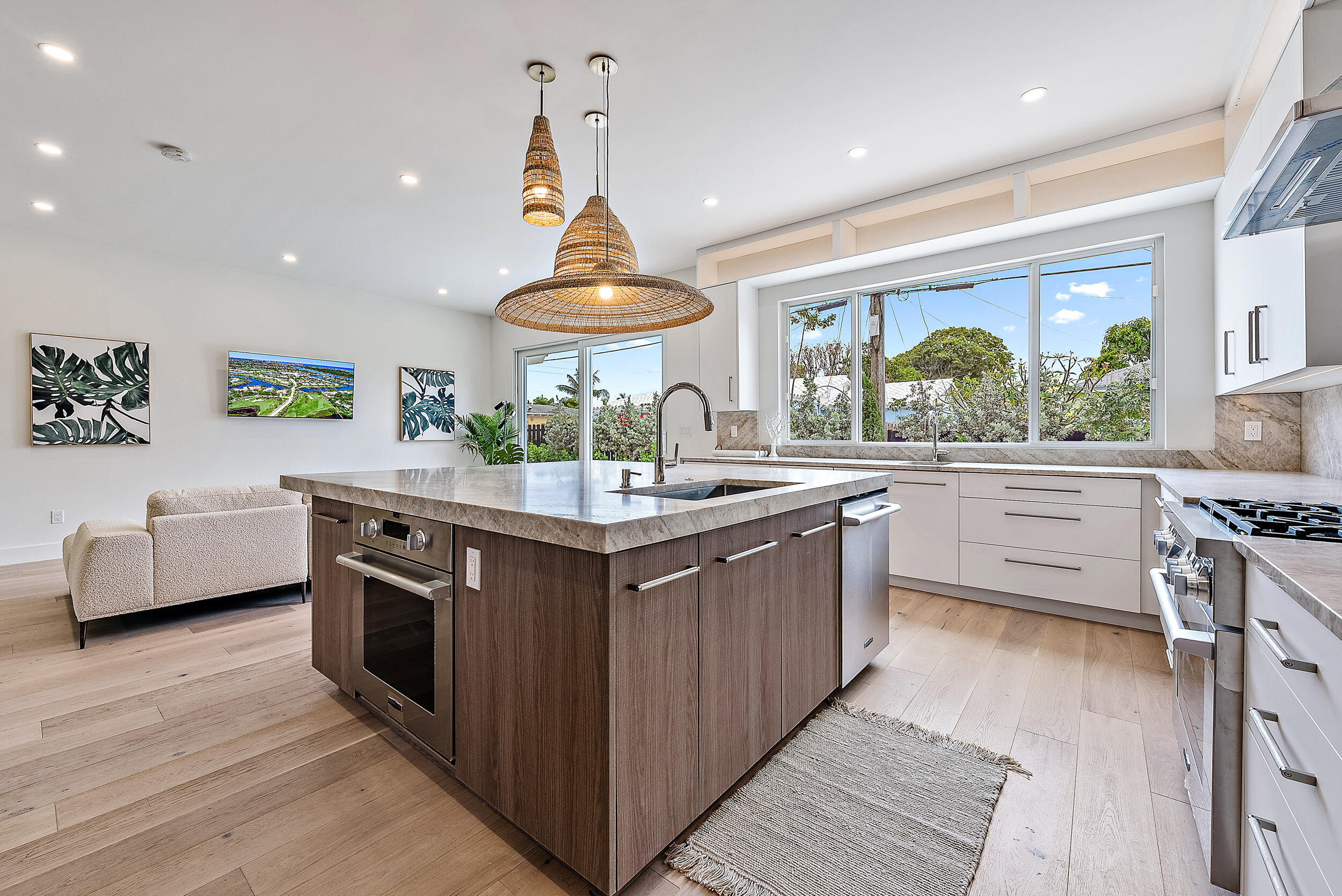 310 Edmor Road West Palm Beach, FL 33405 - Photo 13 of 32 a kitchen with stainless steel appliances a sink and a stove