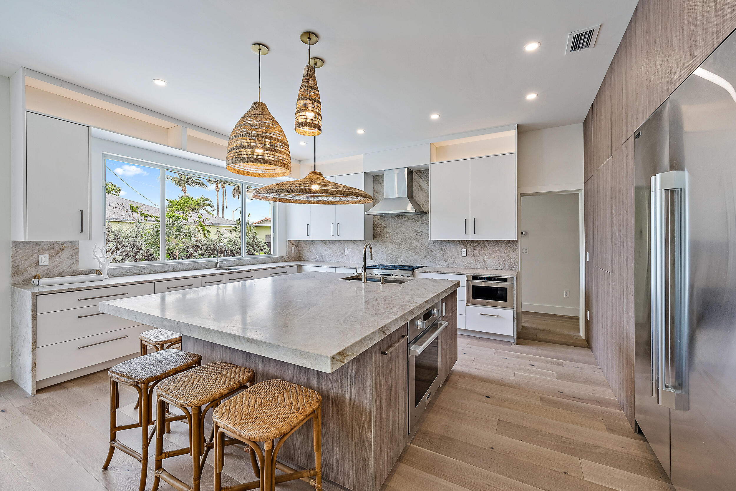 310 Edmor Road West Palm Beach, FL 33405 - Photo 15 of 32 a kitchen with a stove a refrigerator and a sink