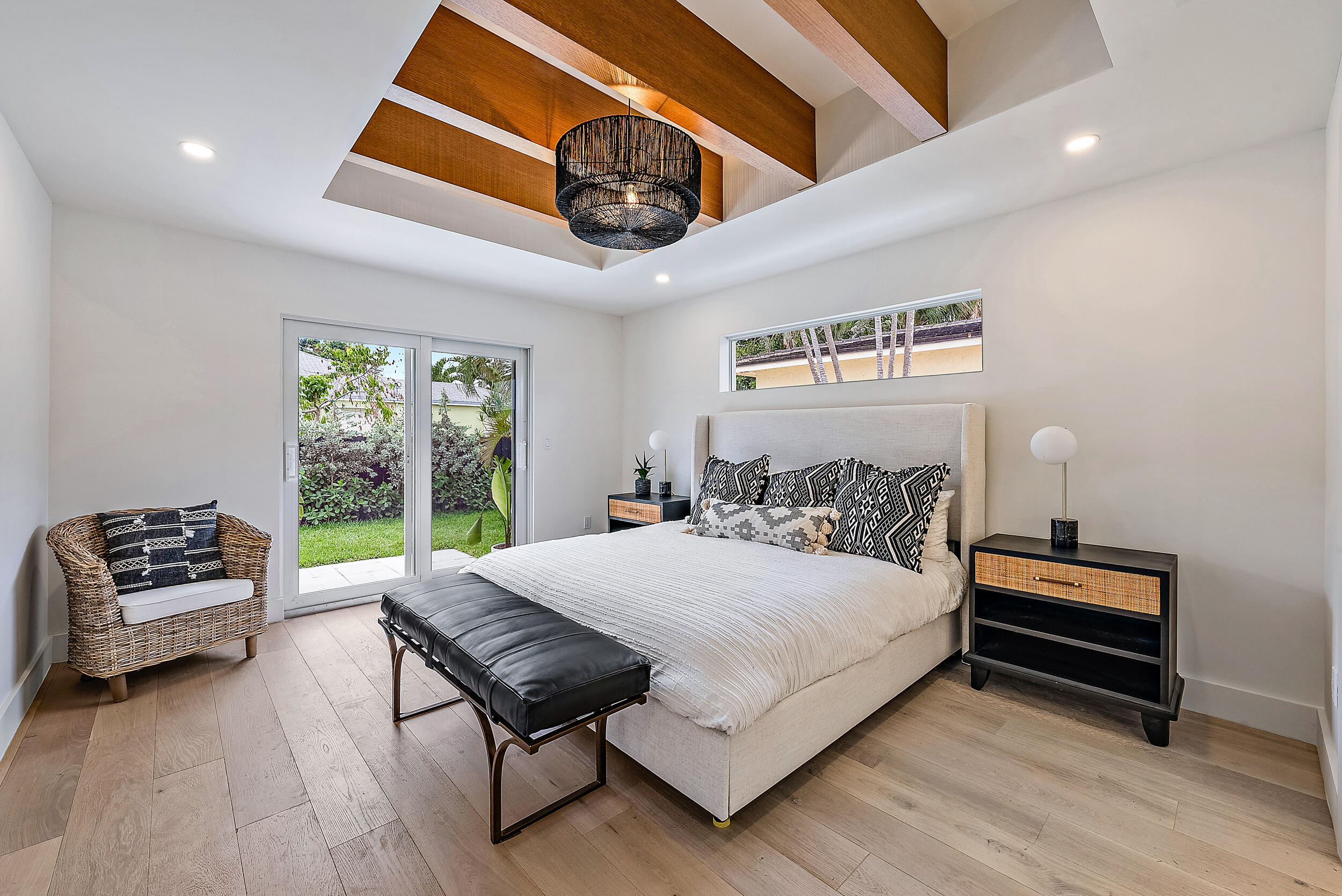 310 Edmor Road West Palm Beach, FL 33405 - Photo 17 of 32 a bedroom with a bed couch and window