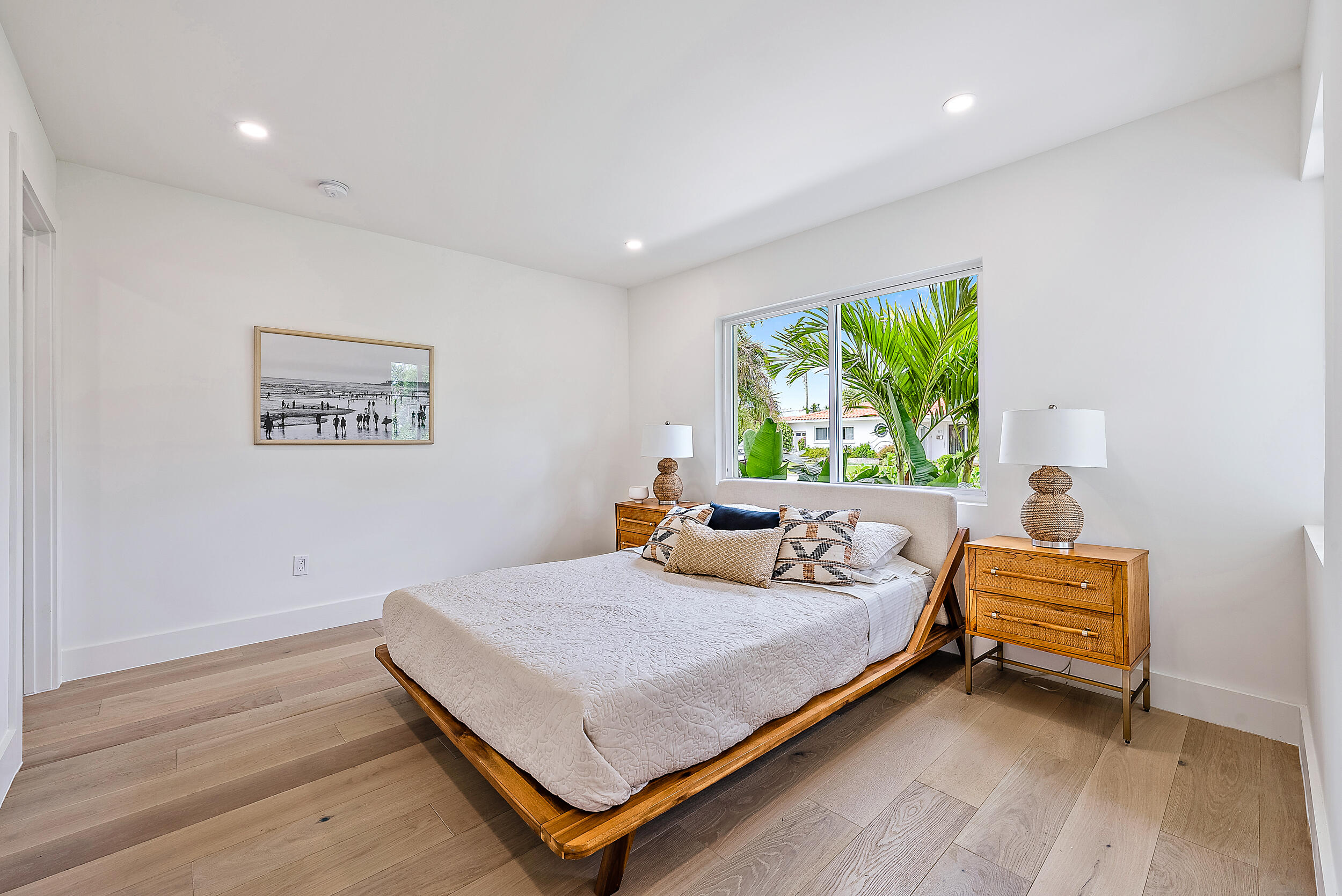 310 Edmor Road West Palm Beach, FL 33405 - Photo 24 of 32 a bedroom with a bed and a large window