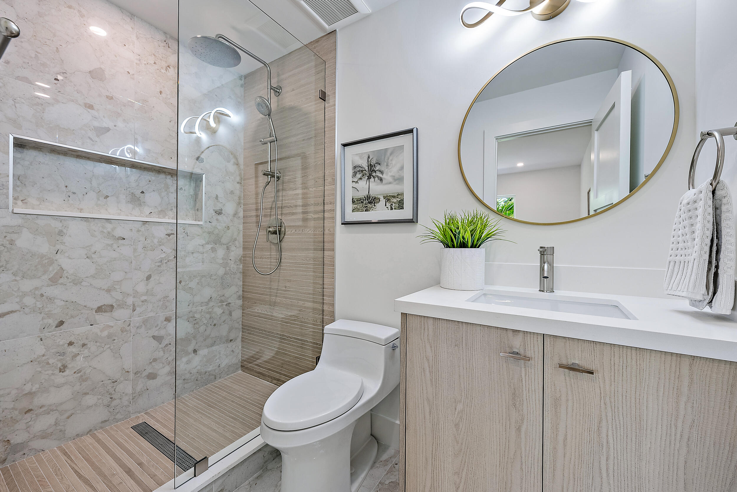 310 Edmor Road West Palm Beach, FL 33405 - Photo 25 of 32 a bathroom with a toilet sink and mirror