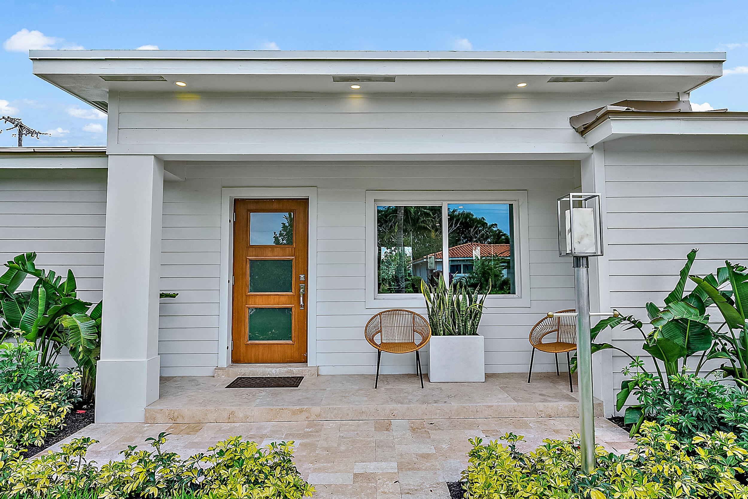 310 Edmor Road West Palm Beach, FL 33405 - Photo 3 of 32 a house view with a outdoor space