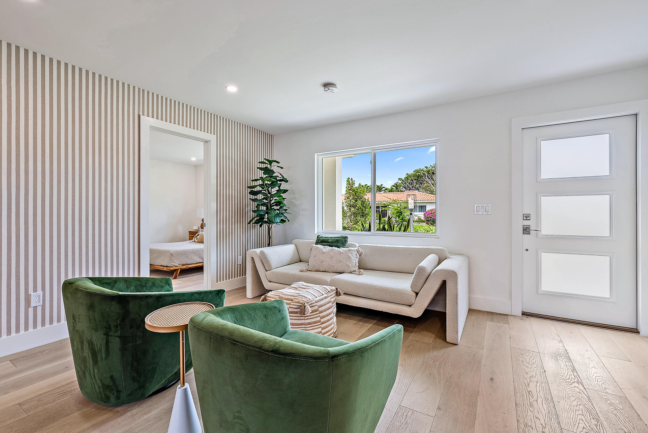 310 Edmor Road West Palm Beach, FL 33405 - Photo 4 of 32 a living room with furniture and a window