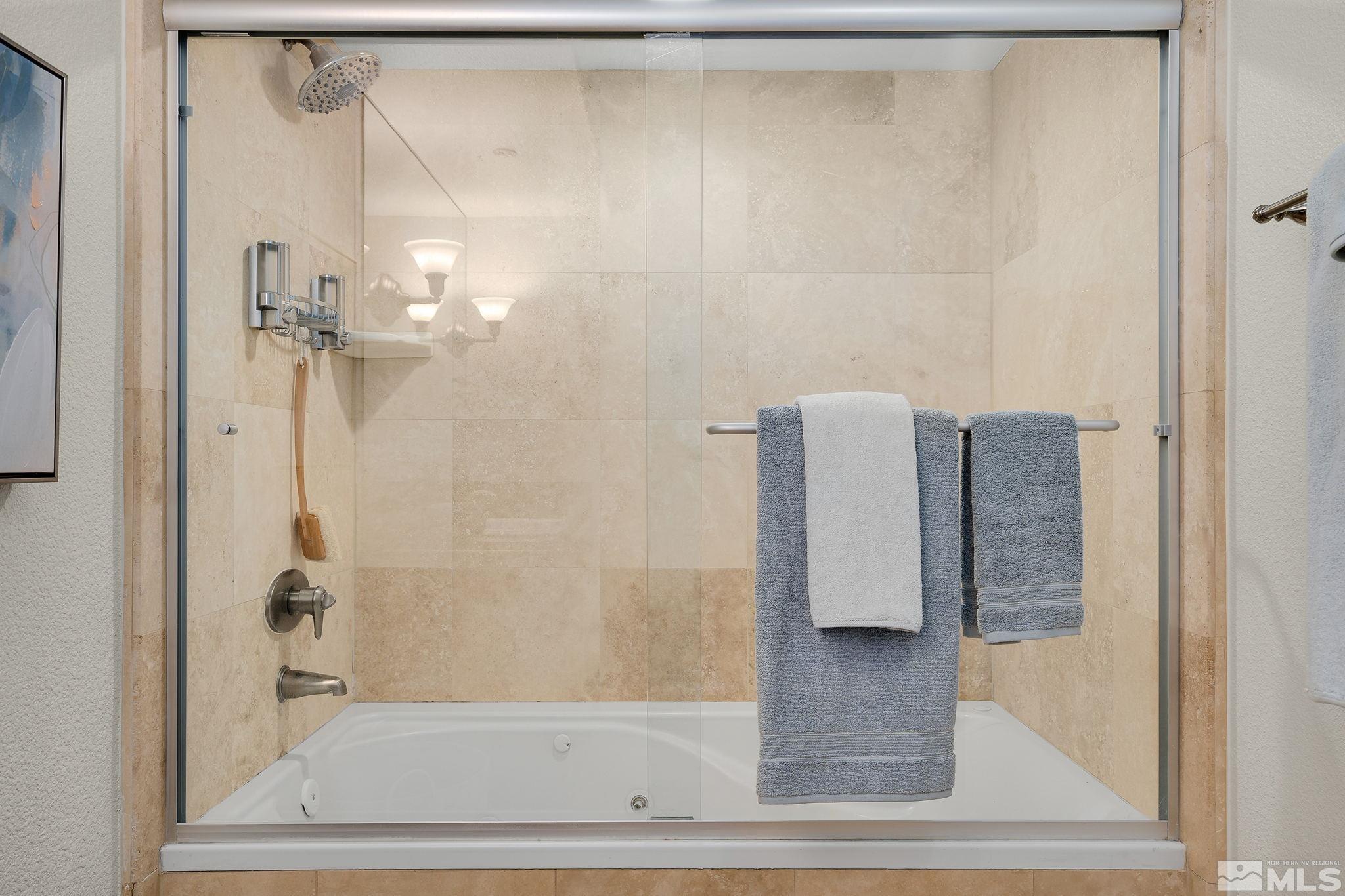 200 West 2nd Street, Unit 1503 Reno, NV 89501 - Photo 11 of 28 a bathroom with a shower