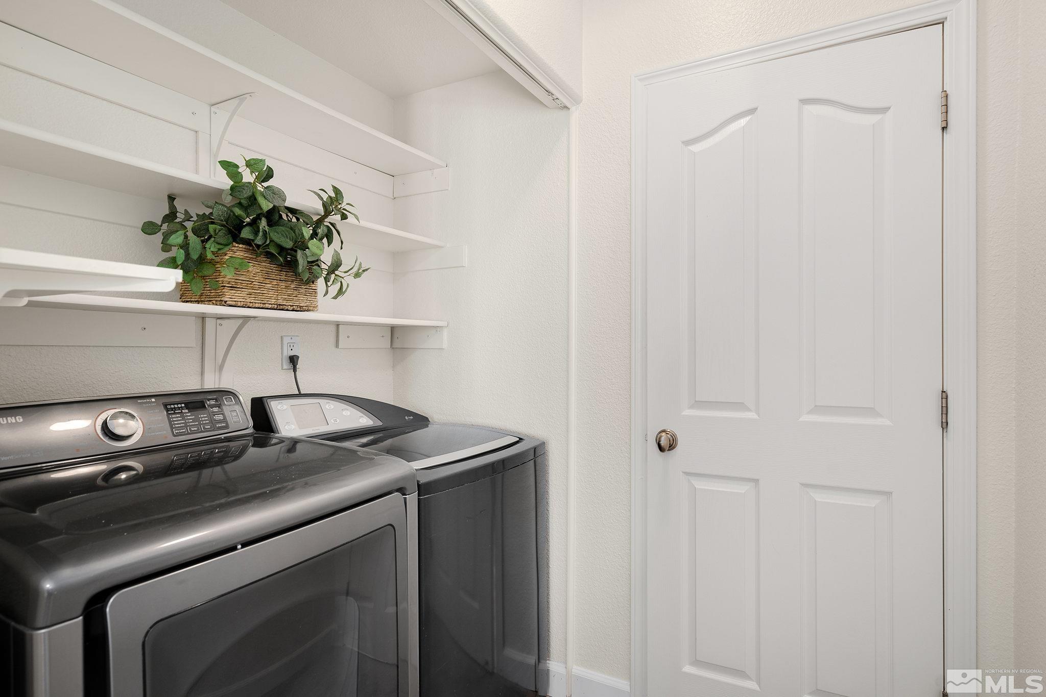 200 West 2nd Street, Unit 1503 Reno, NV 89501 - Photo 12 of 28 a utility room with a sink and wooden floor