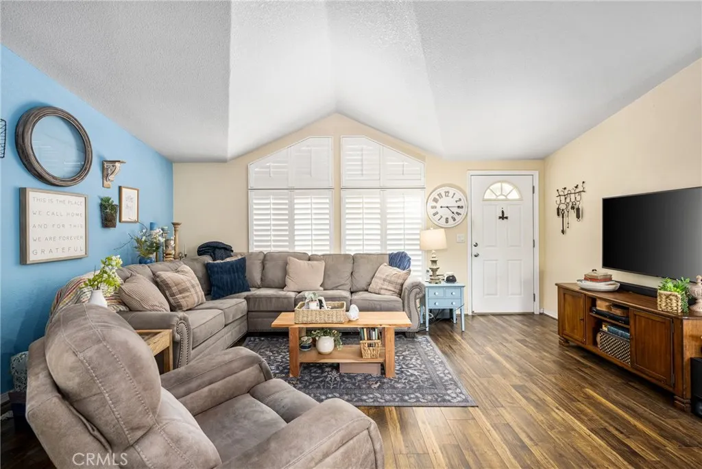 1051 Site, Unit 91 Brea, CA 92821 - Photo 15 of 32 a living room with furniture a flat screen tv and a window