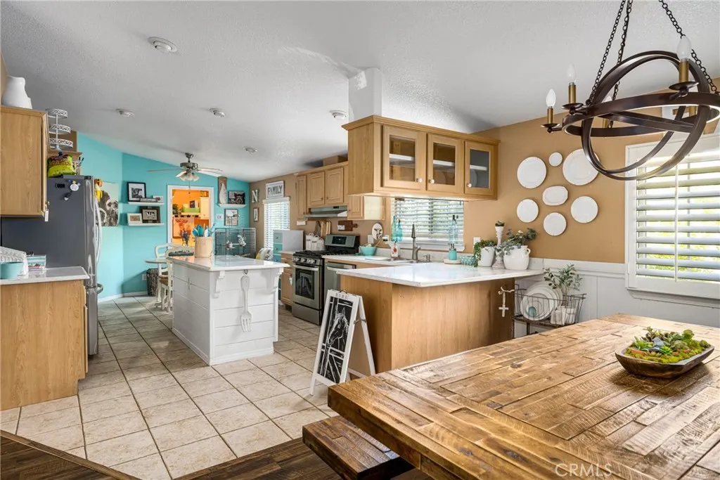 1051 Site, Unit 91 Brea, CA 92821 - Photo 18 of 32 a kitchen with a sink and a stove top oven