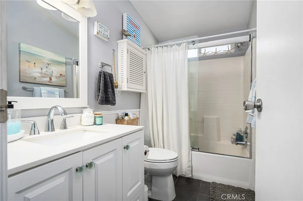 1051 Site, Unit 91 Brea, CA 92821 - Photo 31 of 32 a bathroom with a sink toilet and shower