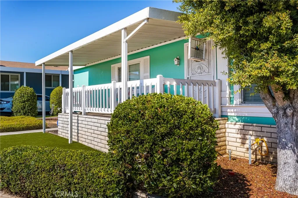 1051 Site, Unit 91 Brea, CA 92821 - Photo 6 of 32 a view of a house with a garden