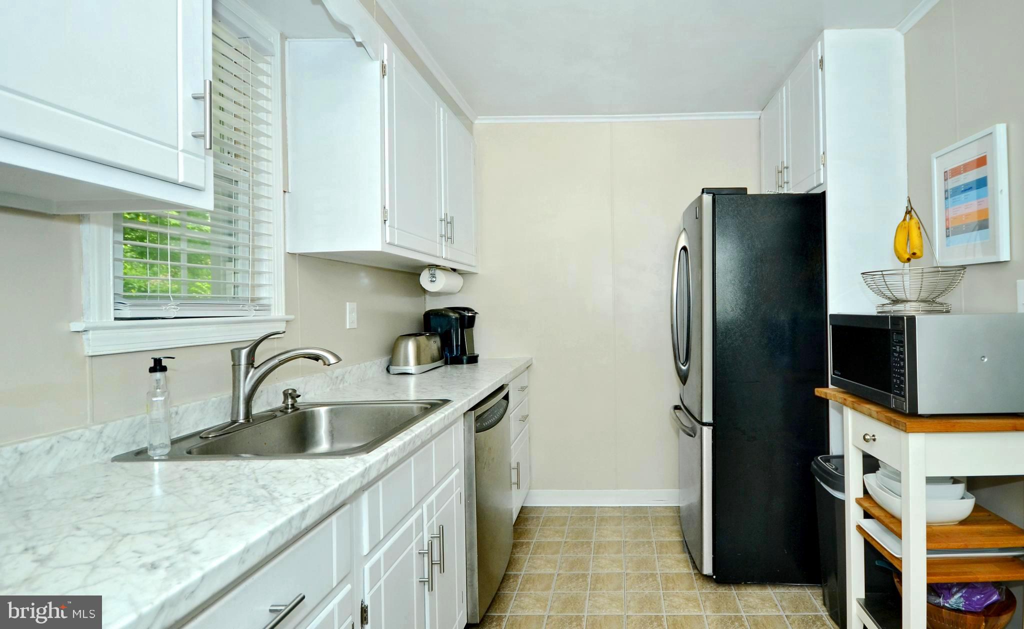 6306 Golden Ring Road Baltimore, MD 21237 - Photo 14 of 28 Appealing & Updated Marble Look Counter Top