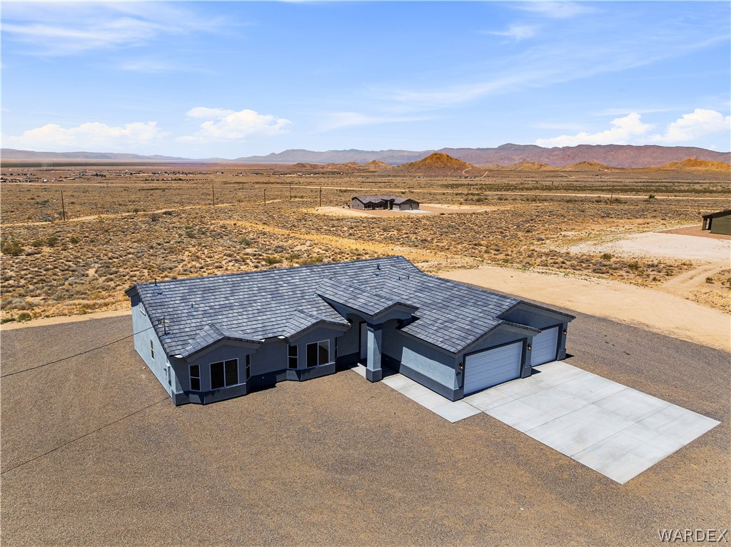 9818 North Cyrus Road Kingman, AZ 86401 - Photo 36 of 42 an aerial view of residential houses with outdoor space and ocean