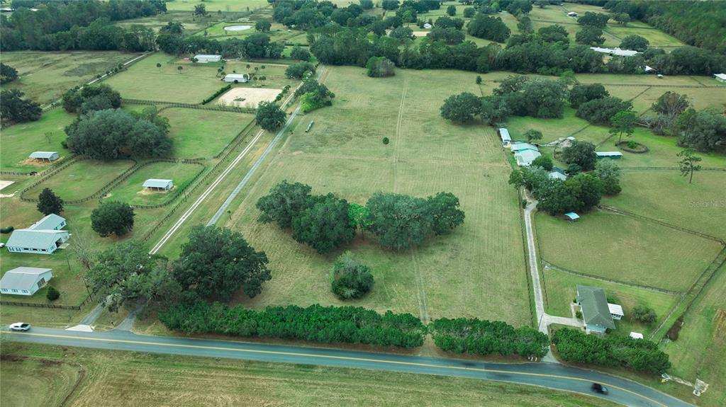 4600 Miller Road Ocala, FL 34482 - Photo 2 of 13 a view of a lake with a yard