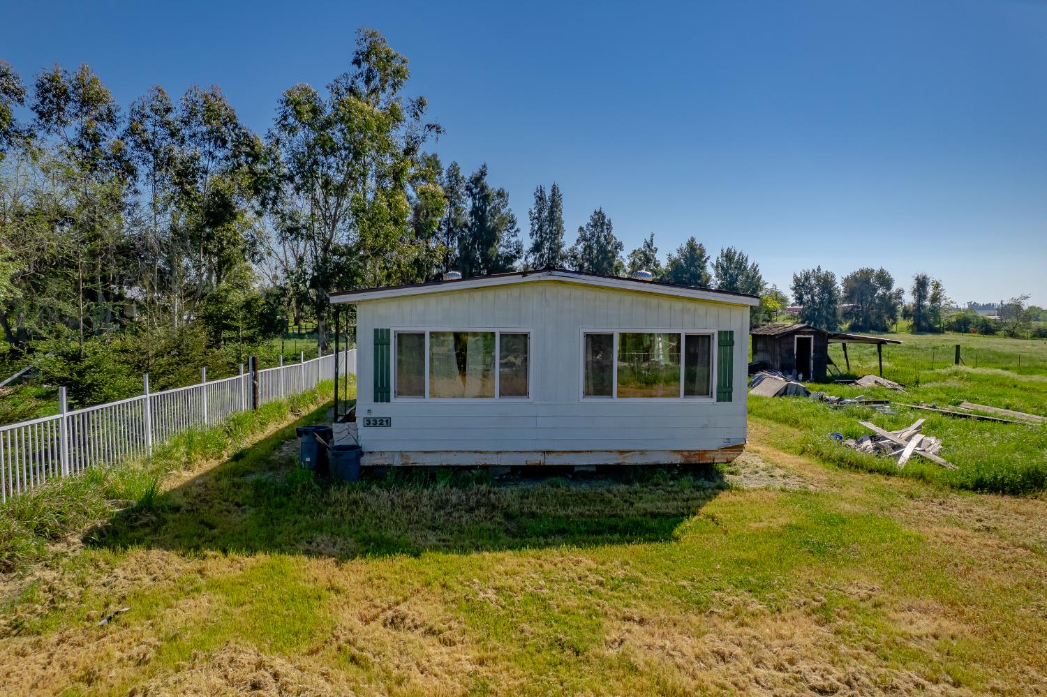 11786 Walmort Road Wilton, CA 95693 - Photo 27 of 89 There is an additional double-wide on the property that is not included in the sale. The owner is willing to sell it separately for $35,000 or best offer. 1300 sq ft and 3/2