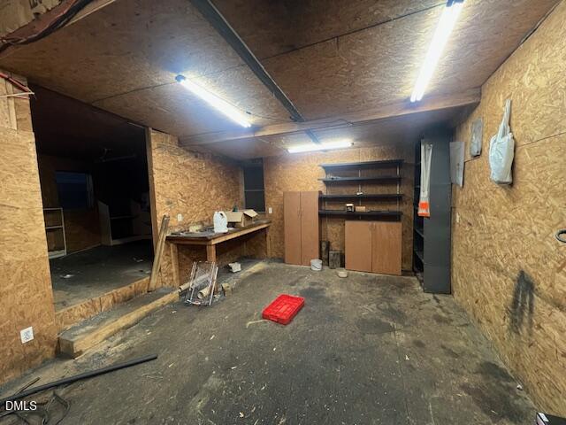 3339 Ebenezer Church Road Benson, NC 27504 - Photo 23 of 27 a living room with furniture a rug and kitchen view