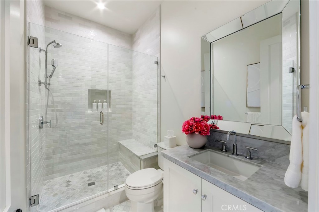 5 Rancho Elastico Road Rolling Hills Estates, CA 90274 - Photo 32 of 48 a bathroom with a bath tub shower sink and toilet