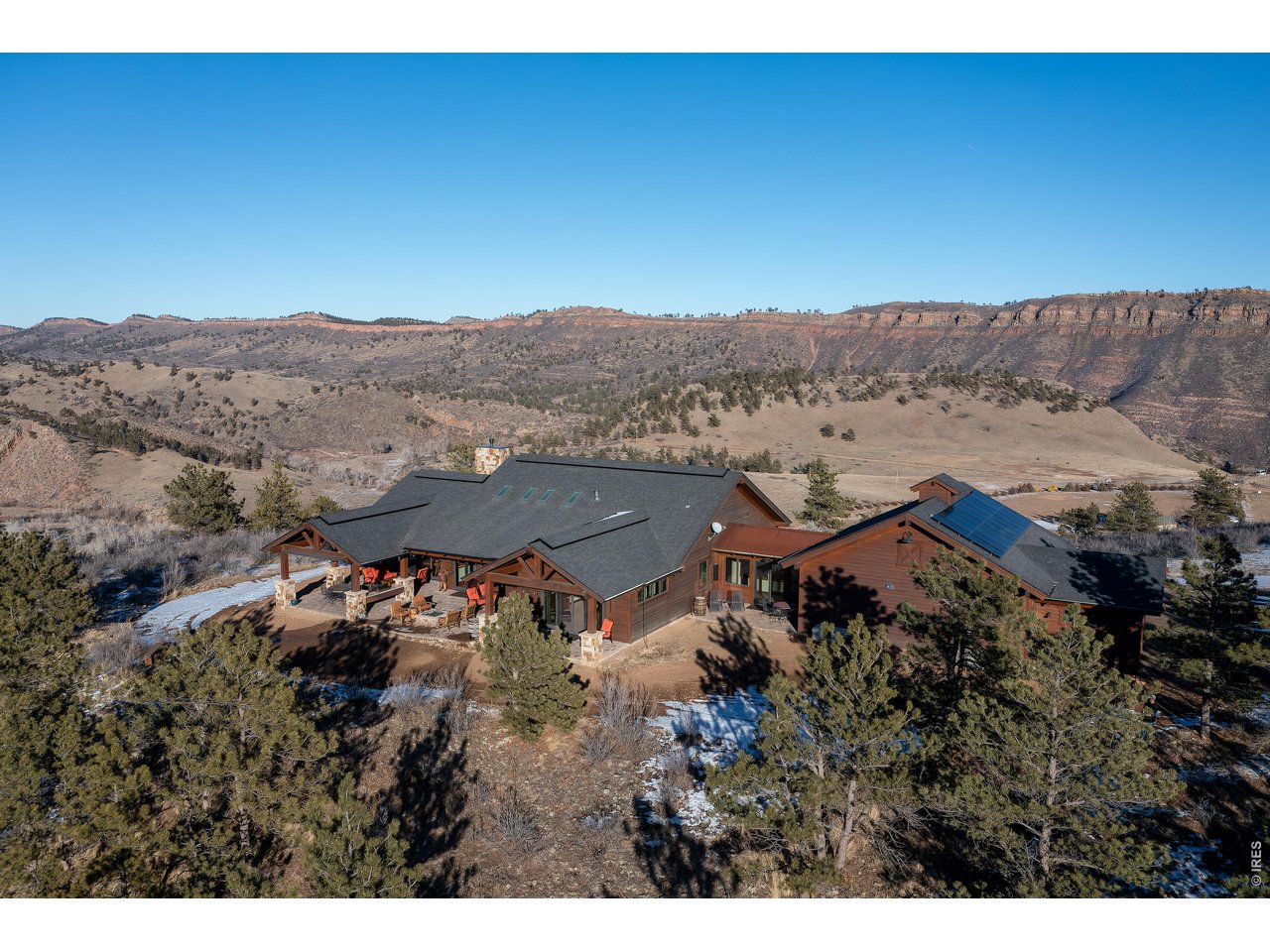 an aerial view of house with yard