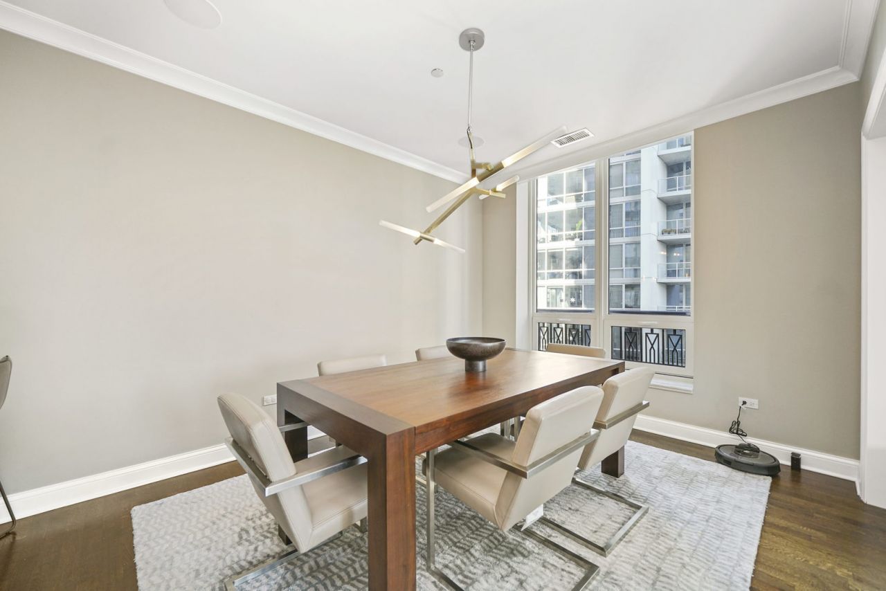 10 East Delaware Place, Unit 18E Chicago, IL 60611 - Photo 15 of 56 a workspace with furniture and window