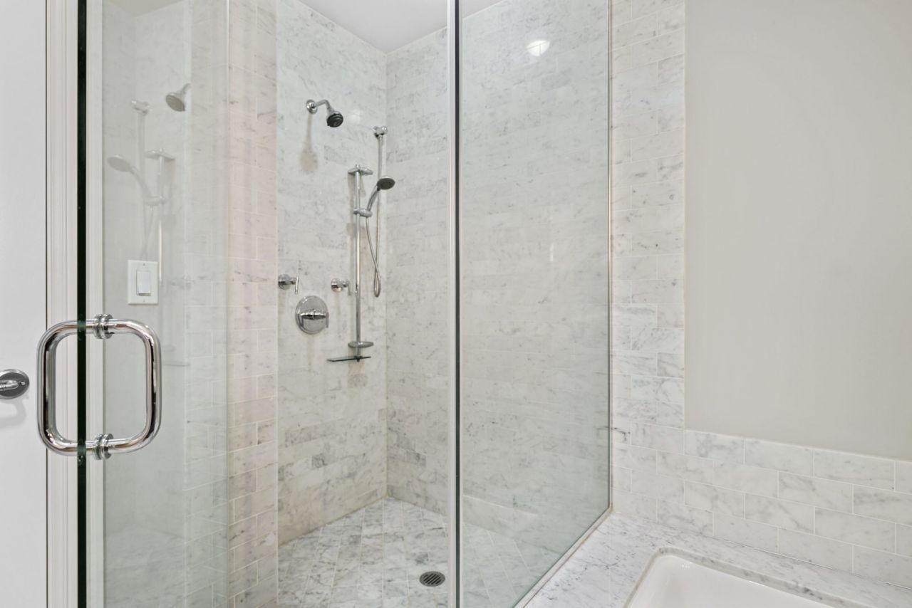 10 East Delaware Place, Unit 18E Chicago, IL 60611 - Photo 25 of 56 a bathroom with a shower