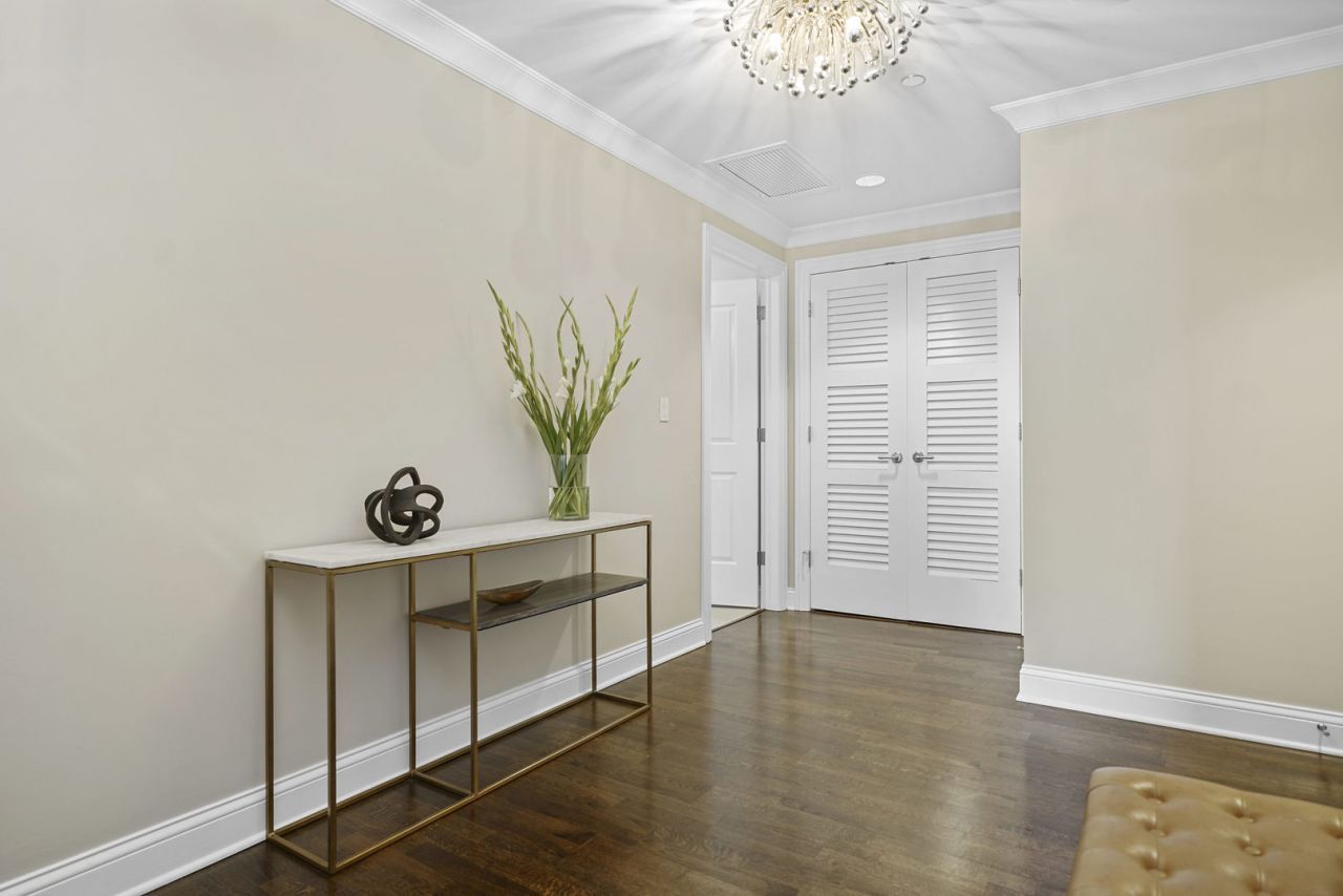 10 East Delaware Place, Unit 18E Chicago, IL 60611 - Photo 34 of 56 an entryway with wooden floor