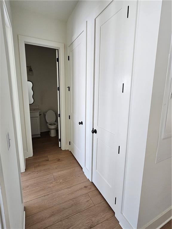 1294 Longreen Terrace Northwest, Unit 2 Atlanta, GA 30318 - Photo 22 of 25 a view of a bathroom from a hallway