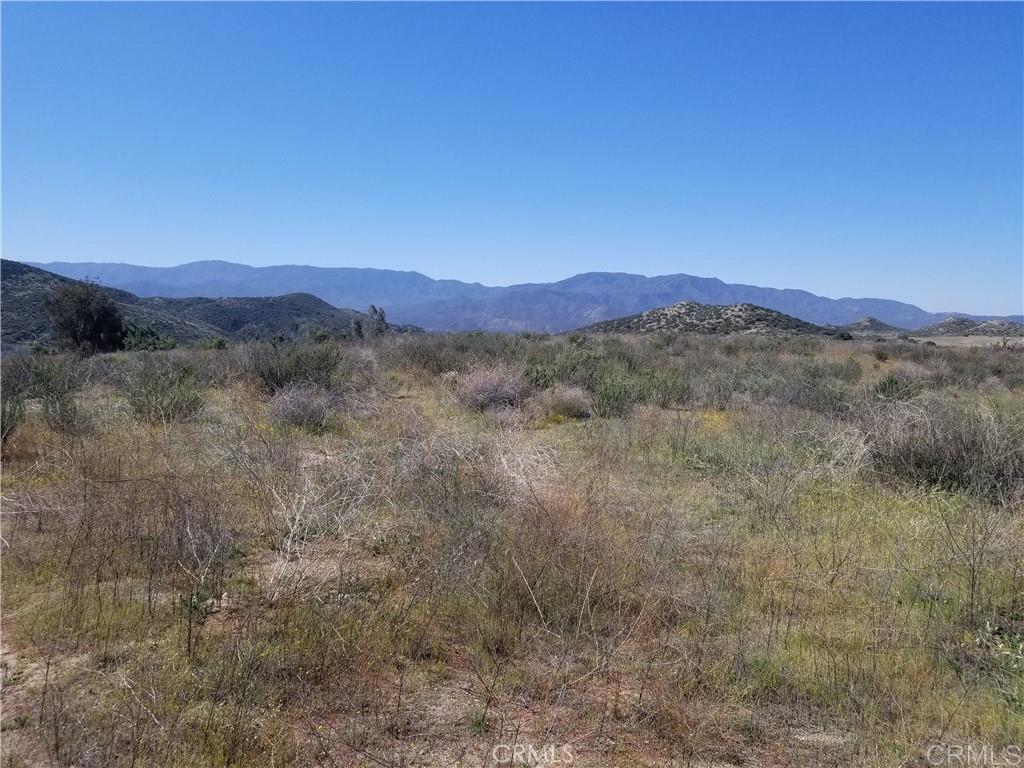 0 Powerline Road Hemet, CA 92544 - Photo 1 of 1 a view of a mountain range with trees in the background