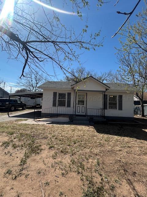 810 South Sweetwater Street Wheeler, TX 79096 - Photo 14 of 14 a front view of a house with a yard