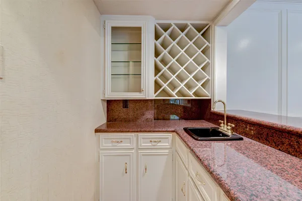 a view of storage and utility room in wooden floor