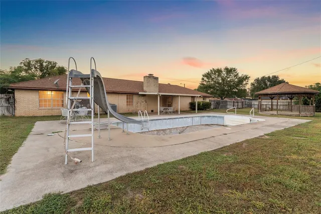 front view of house with a yard