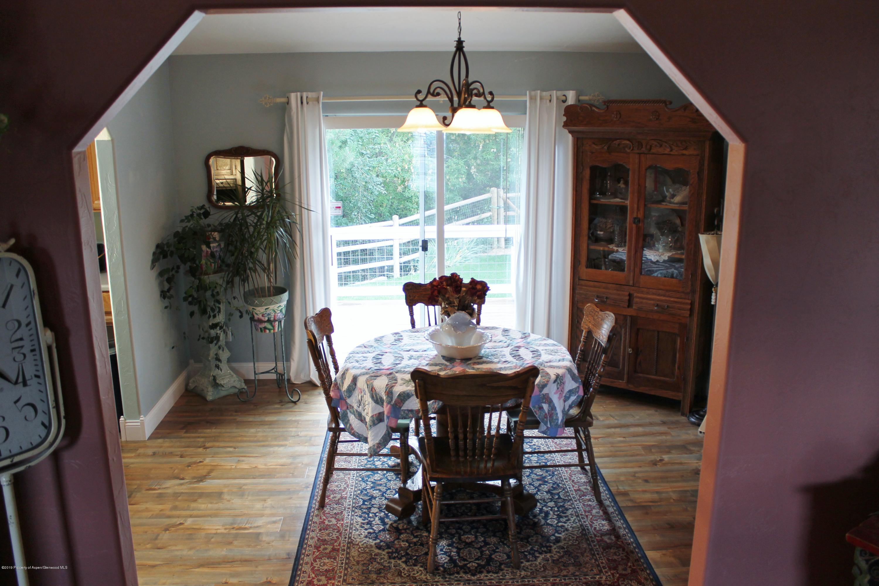 695 Birch Court Rifle, CO 81650 - Photo 17 of 46 a dining room with furniture and window