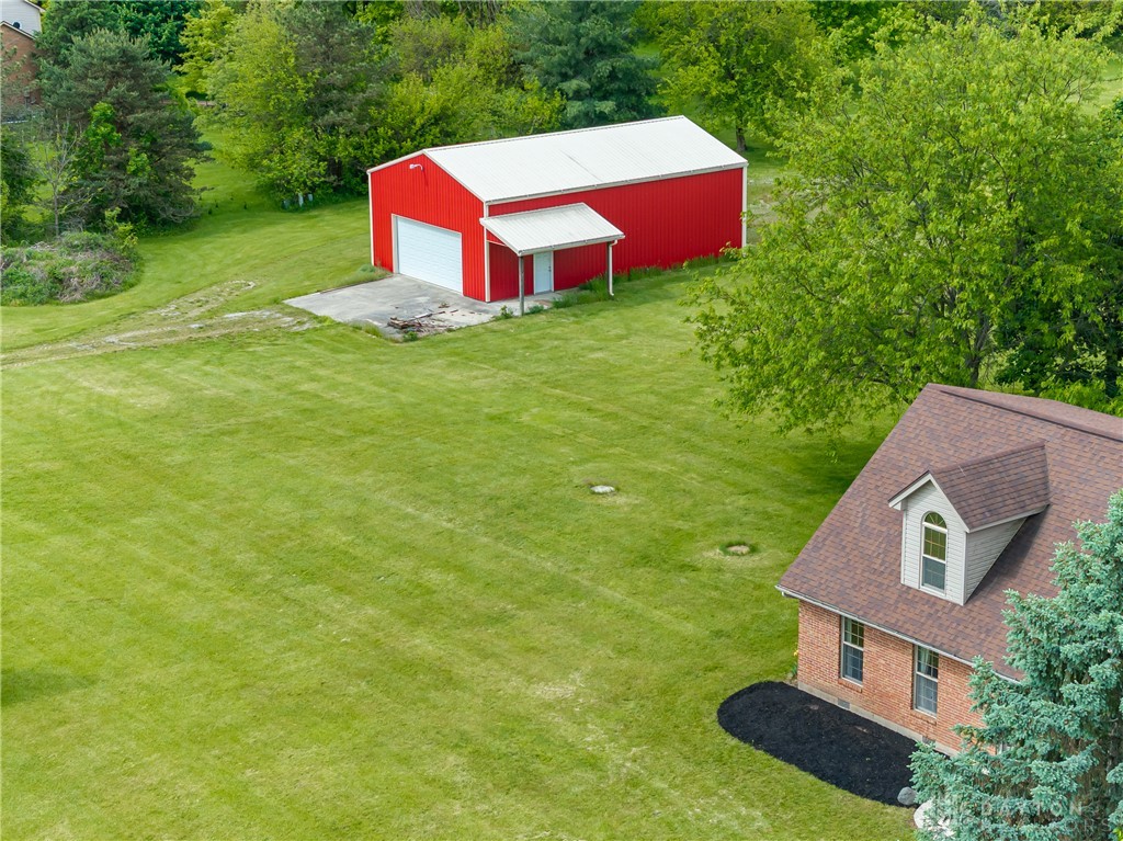9981 Ridge Acres Lane Englewood, OH 45322 - Photo 66 of 73 Expansive green grounds surround this charming home and a versatile outbuilding.