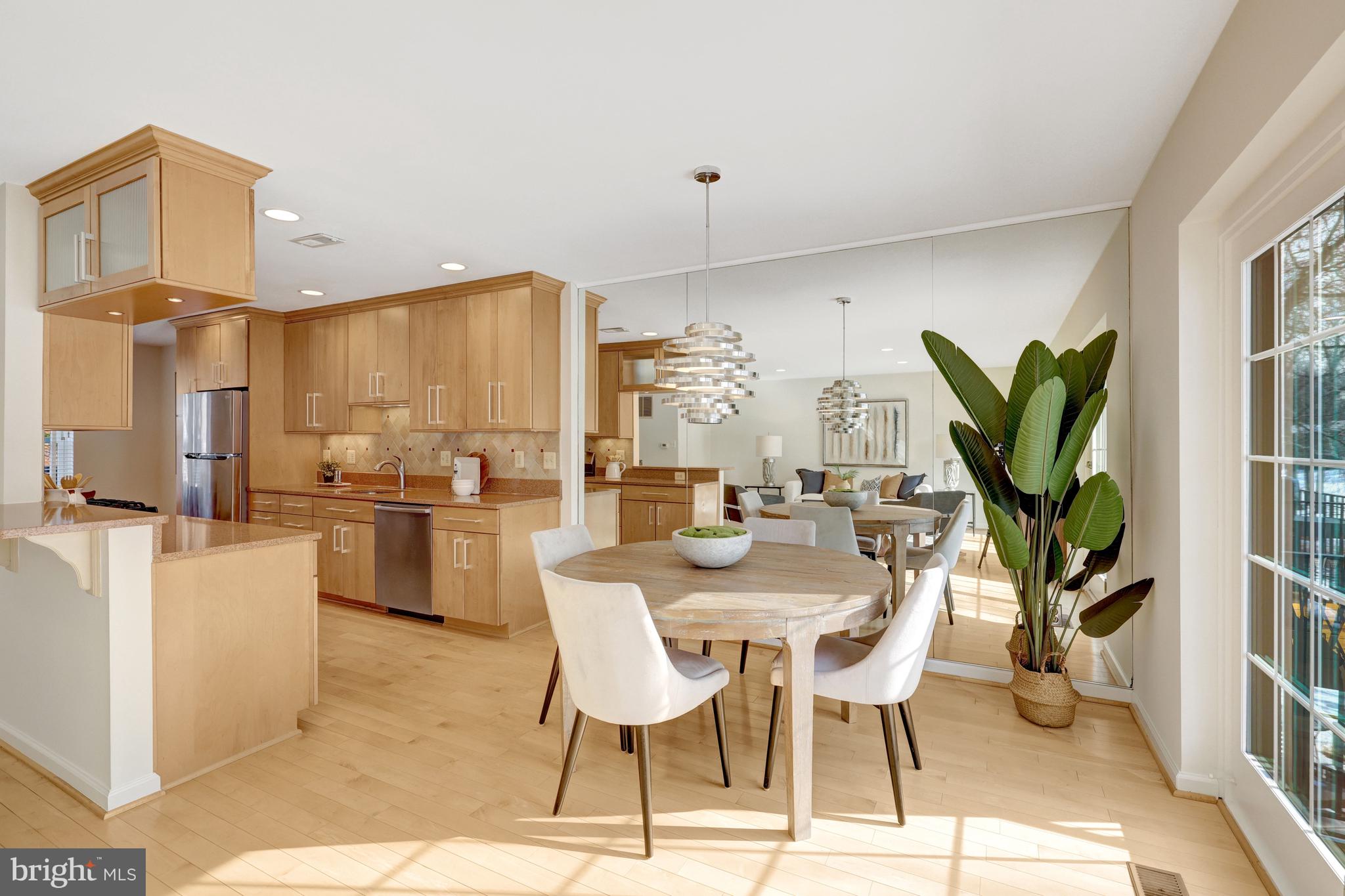 2120 Golf Course Drive Reston, VA 20191 - Photo 13 of 63 The dining room opens to the living room & kitchen