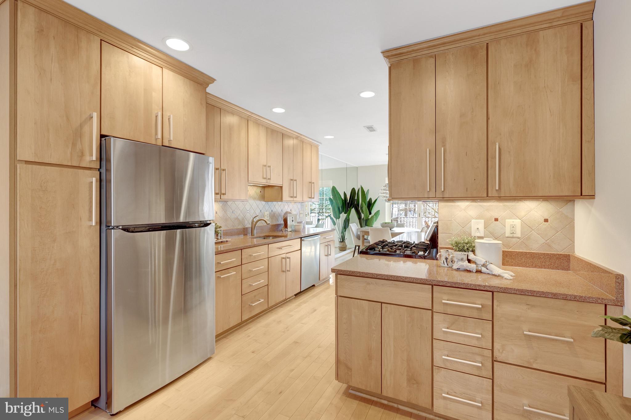 2120 Golf Course Drive Reston, VA 20191 - Photo 19 of 63 Stainless steel appliances and ample cabinet space