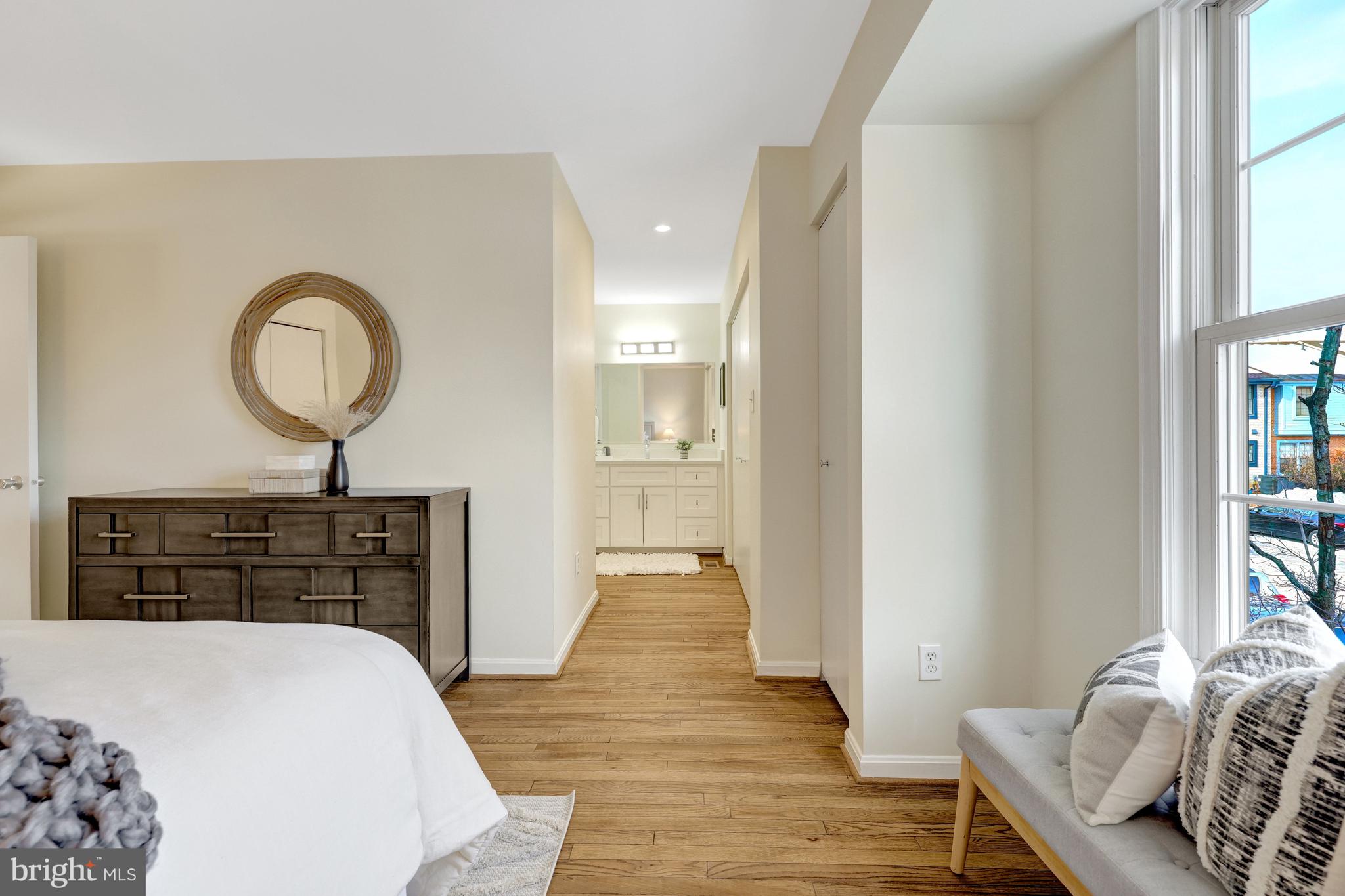 2120 Golf Course Drive Reston, VA 20191 - Photo 27 of 63 The primary bedroom has an ensuite bath.