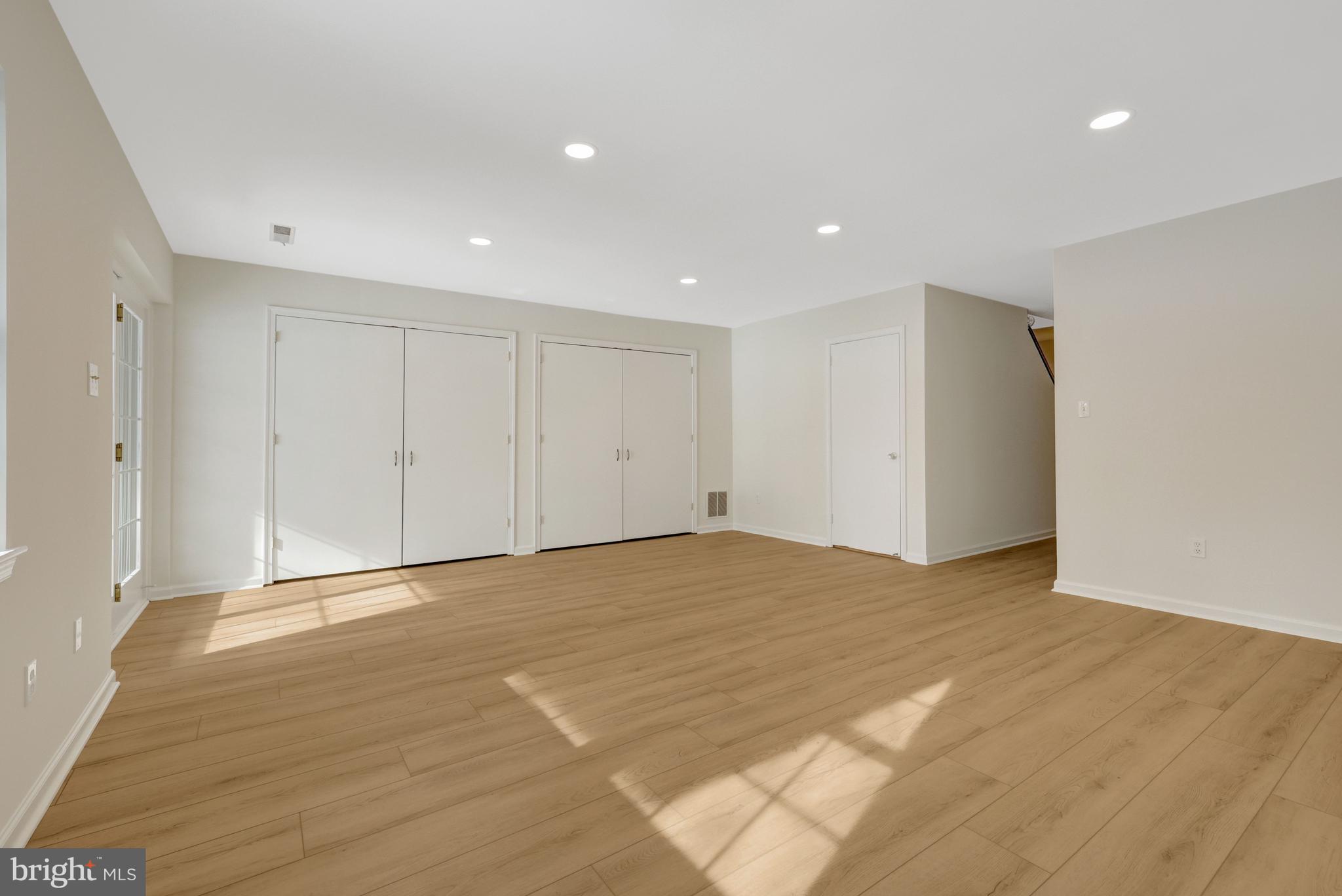 2120 Golf Course Drive Reston, VA 20191 - Photo 37 of 63 Two sets of large closets in the recreation room.