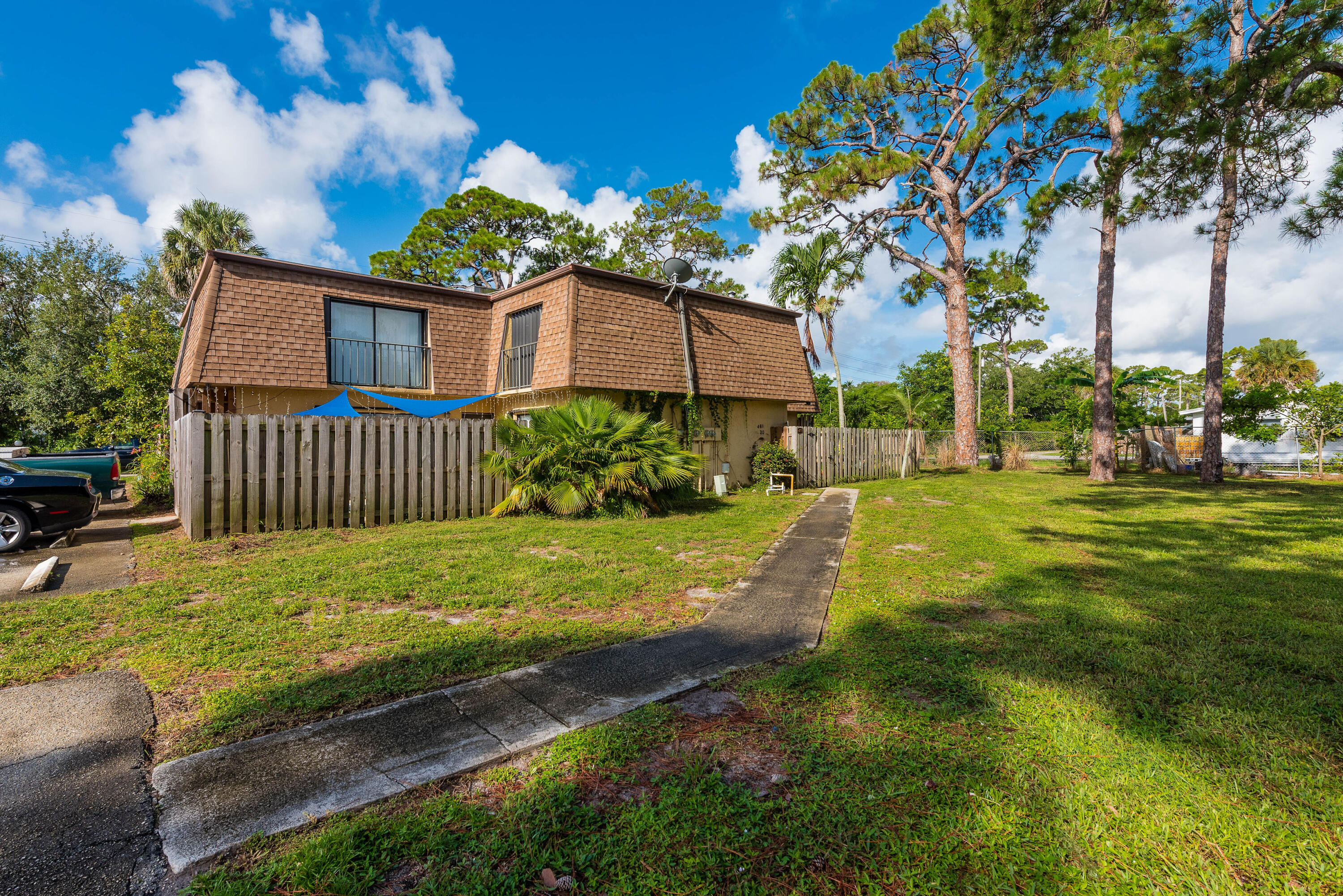 471 Kirk Road, Unit D West Palm Beach, FL 33406 - Photo 28 of 28 a view of a house with a yard