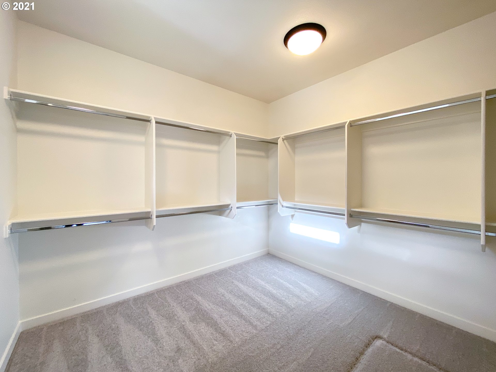 814 South Goose Loop Ridgefield, WA 98642 - Photo 15 of 22 an empty room with wooden floor and windows