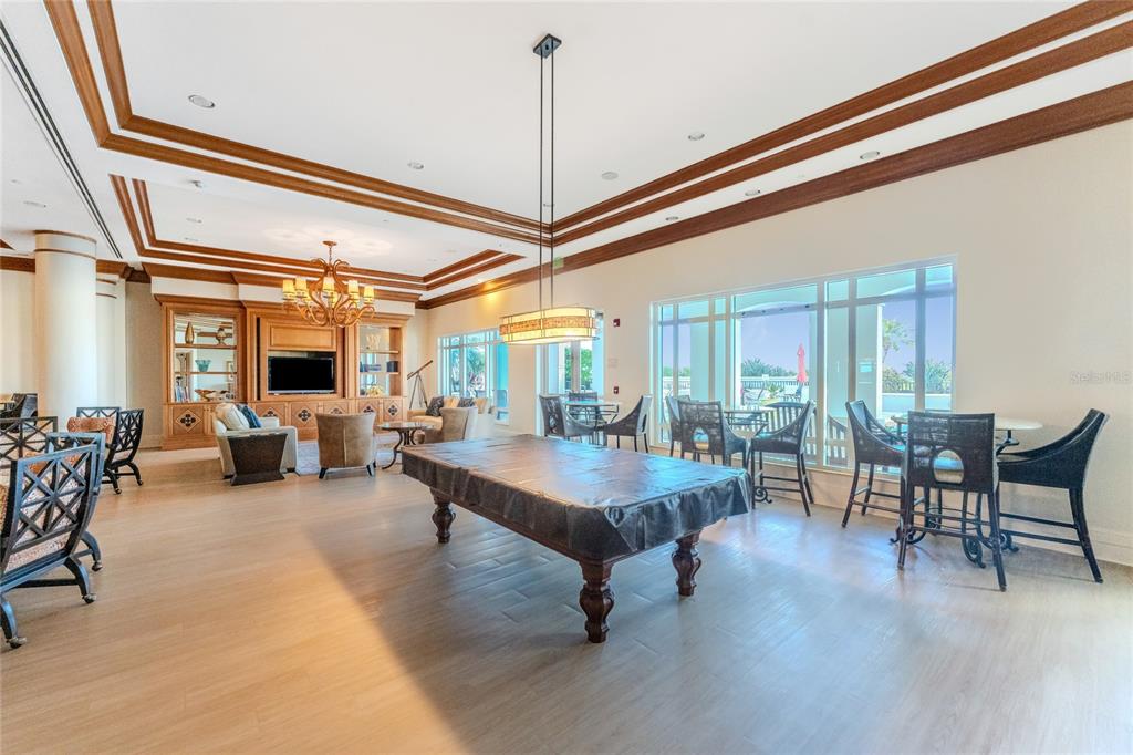 3333 Sunset Key Circle, Unit 506 Punta Gorda, FL 33955 - Photo 65 of 78 a living room with furniture a window and a table