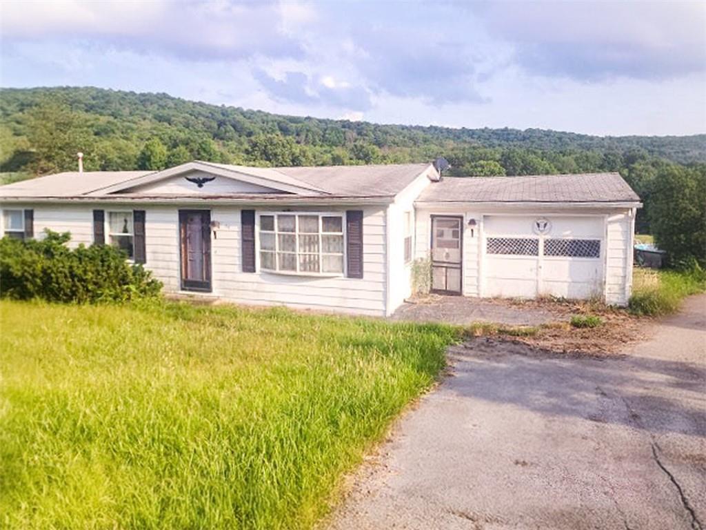 64 King Eldred, PA 16713 - Photo 2 of 15 a view of a house with a garden