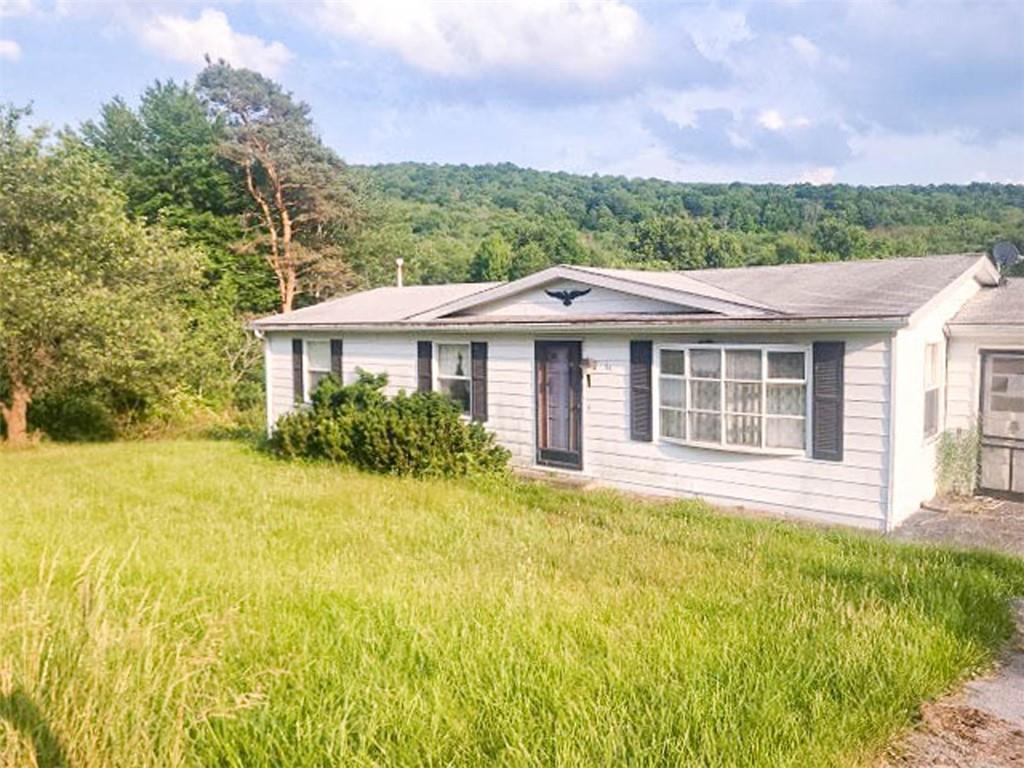 64 King Eldred, PA 16713 - Photo 3 of 15 a view of a house with a garden