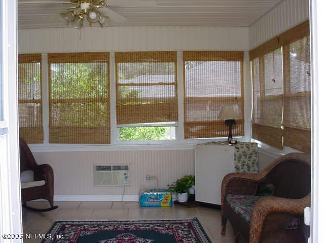 2498 Mallory Hills Road Jacksonville, FL 32221 - Photo 4 of 9 a living room with furniture and a window