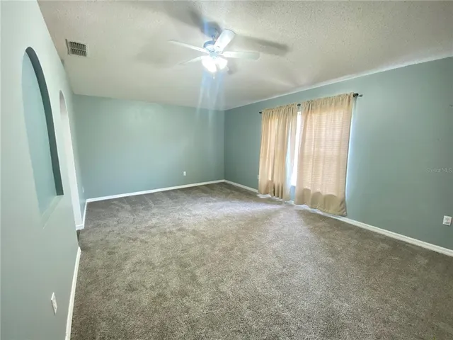 a view of a room with a swimming pool