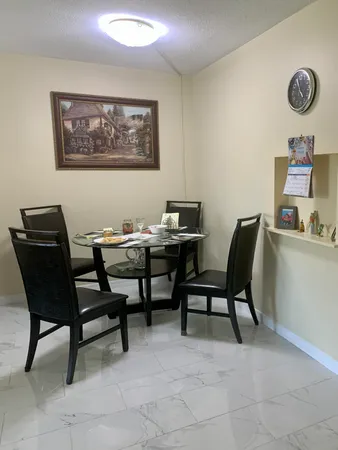 a view of a dining room with furniture